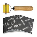 Sound Damping tools including a roller and sheets for effective sound absorption.
