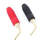 Red and black speaker connectors with gold-plated tips for audio equipment, featured as Speaker Connectors.