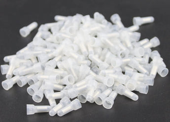 1000 white crimp cap connectors in a pile, ideal for electrical wiring and connections. Nylon, closed ends for secure fit.